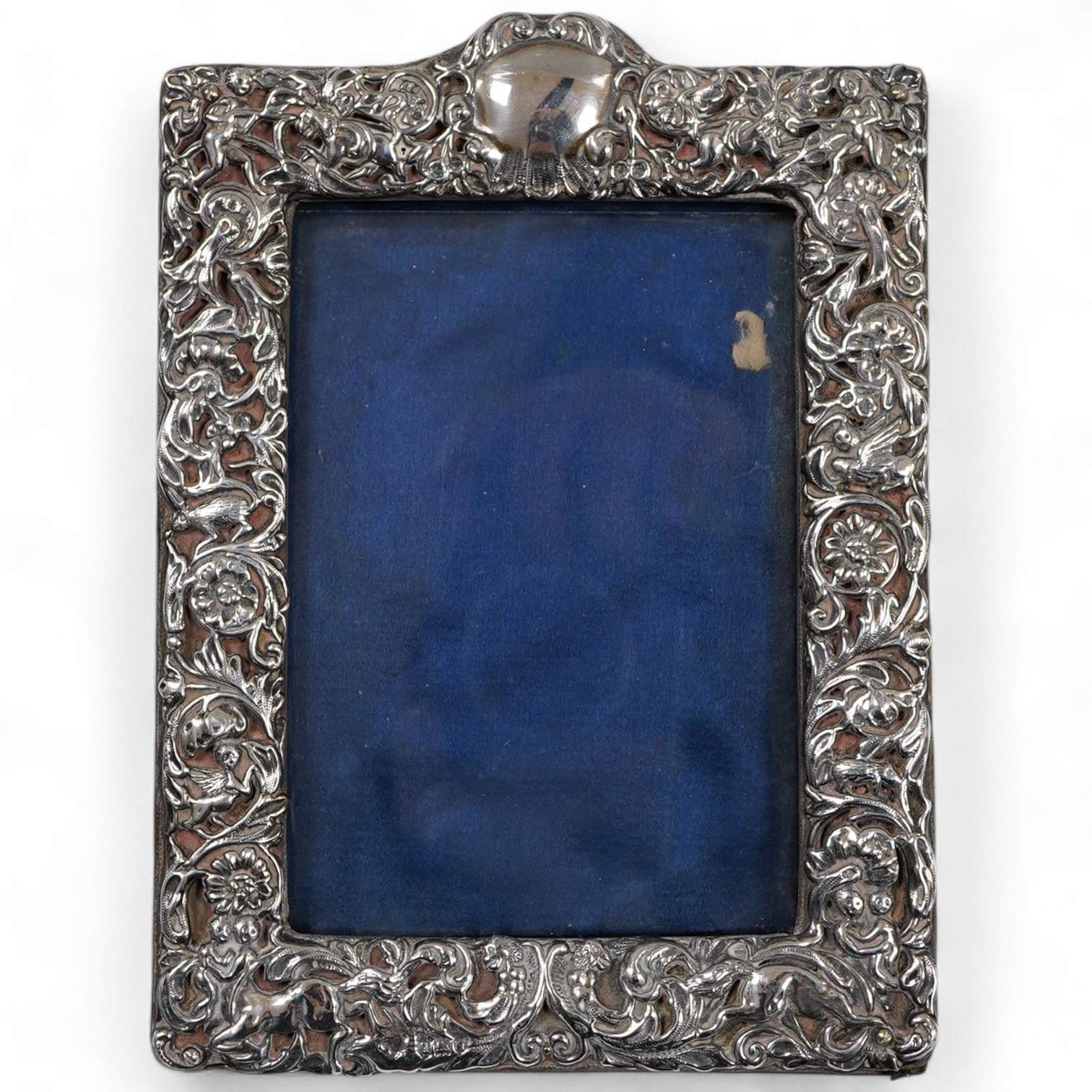 A George V repousse silver mounted rectangular photograph frame, maker's mark rubbed, London, 1911, 18.3cm.